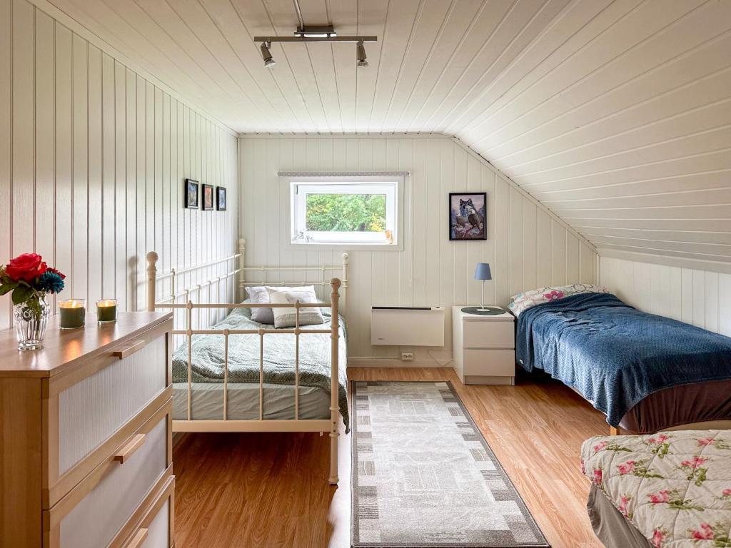 Postel nebo postele na pokoji v ubytování Holiday Home Rødehuset by Interhome