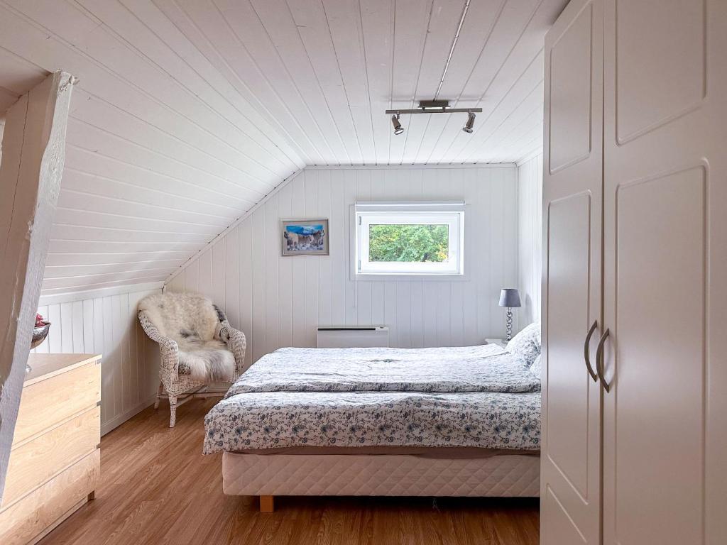 Postel nebo postele na pokoji v ubytování Holiday Home Rødehuset by Interhome