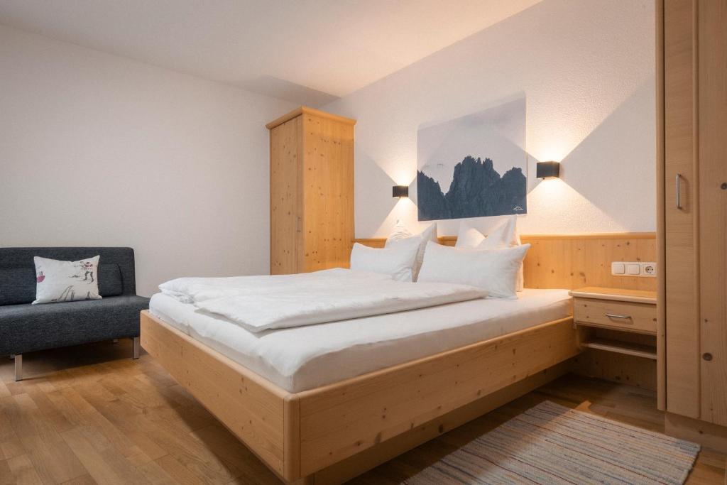 Posteľ alebo postele v izbe v ubytovaní Apartments SARLO