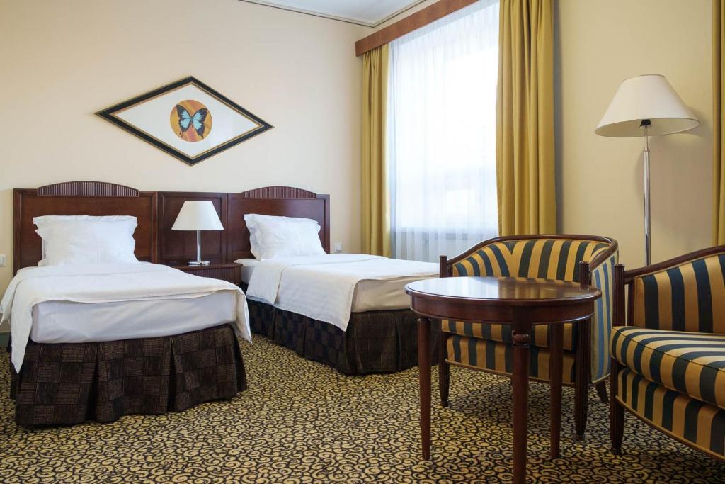 Postel nebo postele na pokoji v ubytování Grand Hotel Viljandi