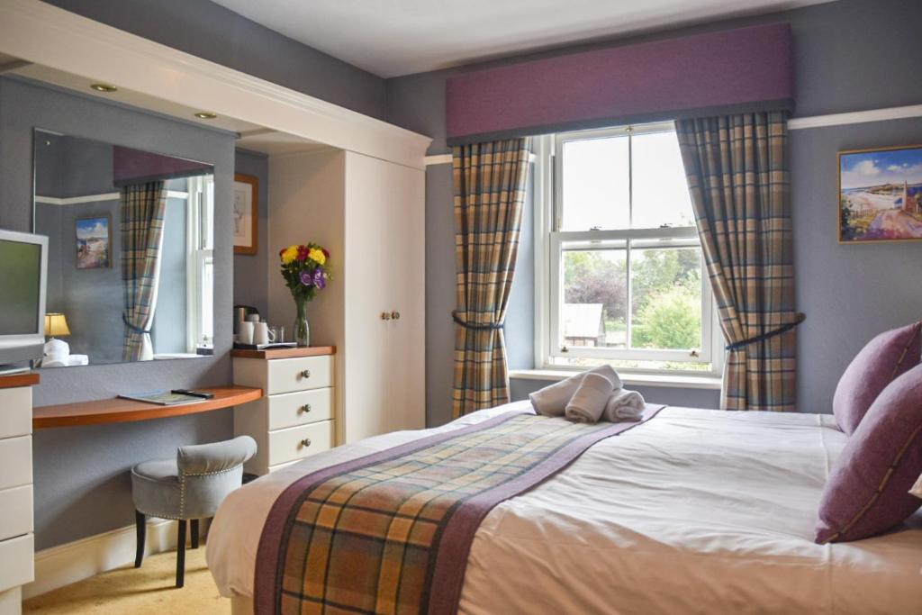 The Dunstanburgh Castle Hotel 객실 침대