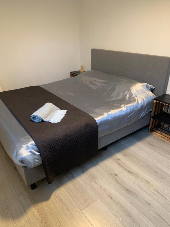 Postel nebo postele na pokoji v ubytování Blauwersnest