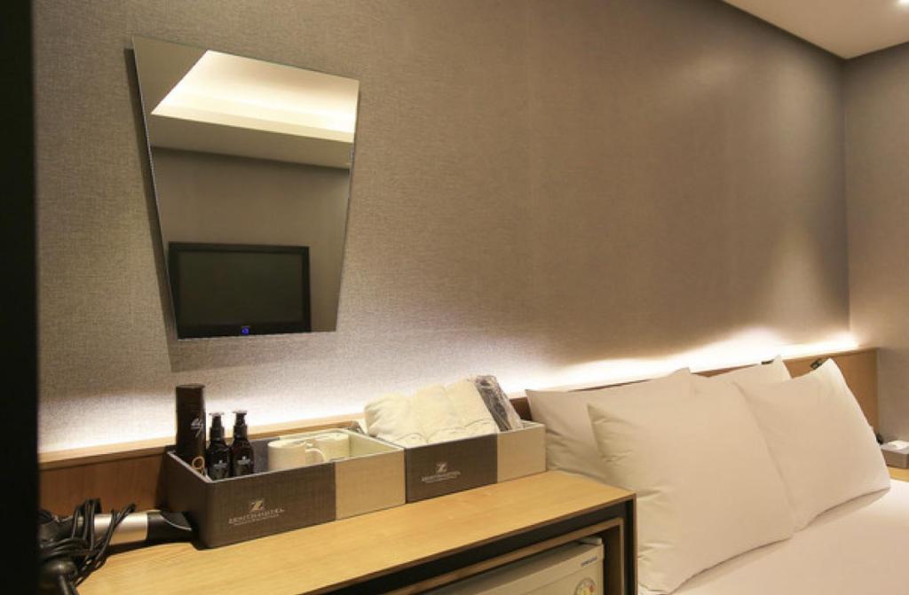 TV a/nebo společenská místnost v ubytování Zenith Hotel Bupyeong