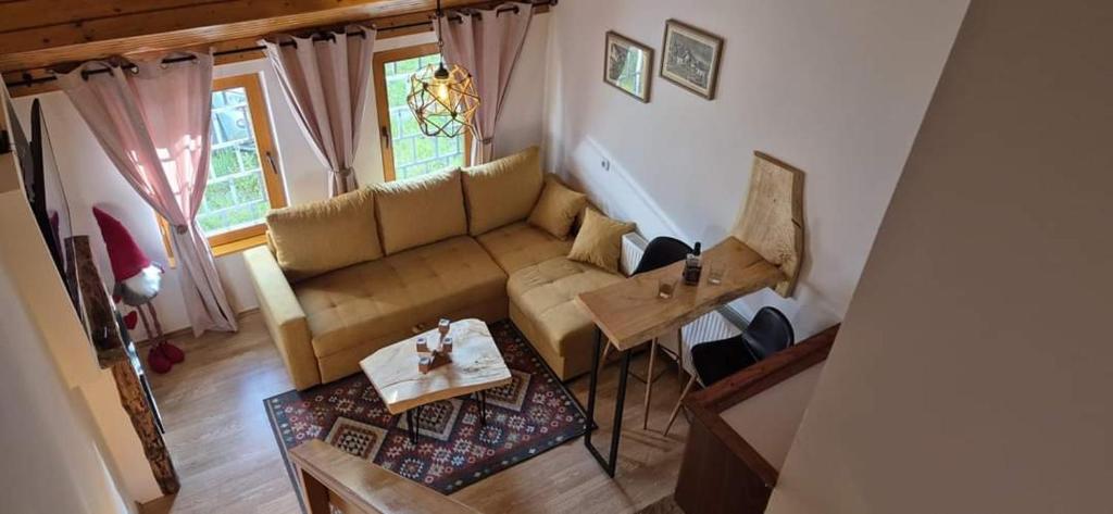 a living room with a couch and a table at Viktory II in Vlasic
