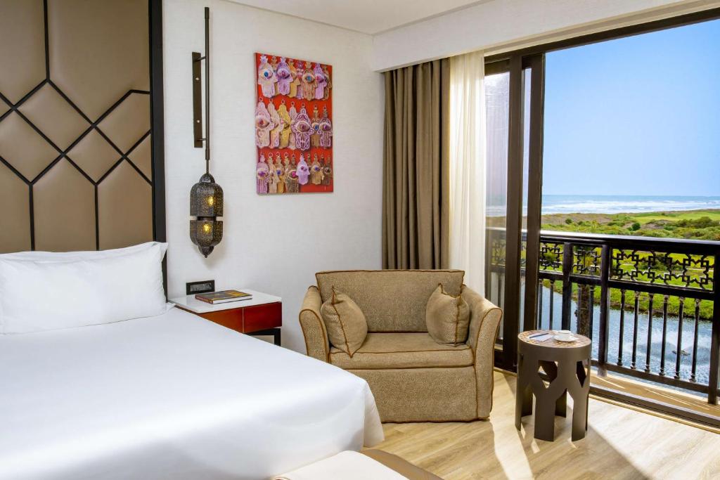 Postel nebo postele na pokoji v ubytování Mazagan Beach & Golf Resort