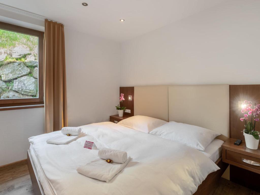 Posteľ alebo postele v izbe v ubytovaní Apartment Emma-4 by Interhome