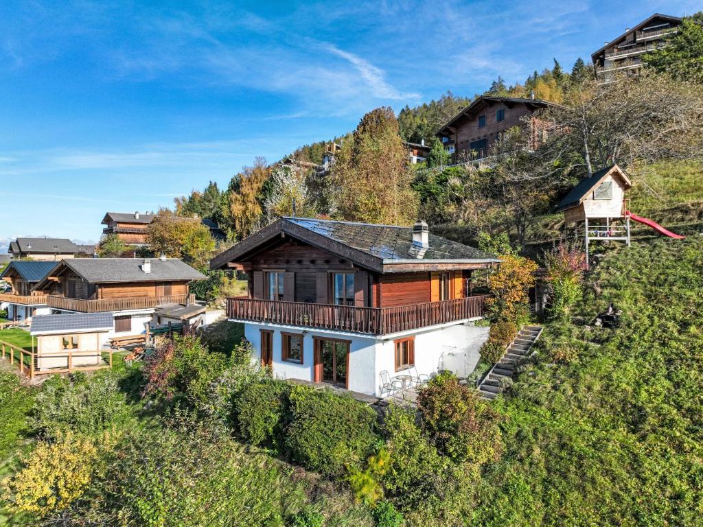 an aerial view of a house on a hill at Chalet Nelly by Interhome in Veysonnaz