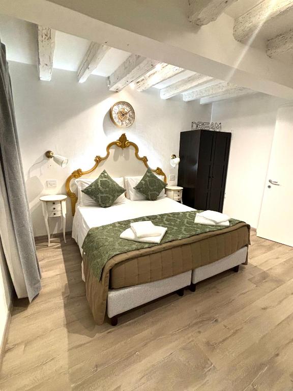 Postel nebo postele na pokoji v ubytování Al Canal Regio - Guest House