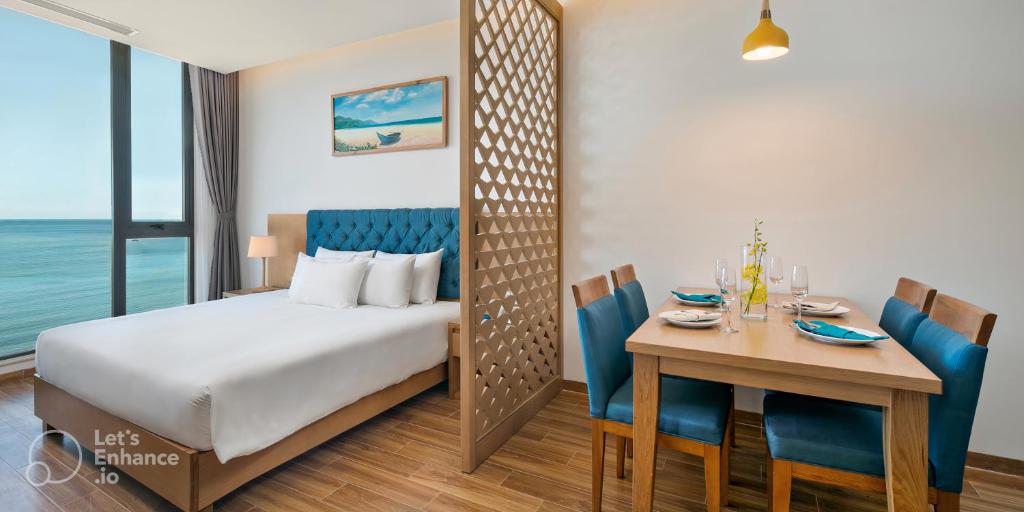 Postel nebo postele na pokoji v ubytování Seashore Hotel & Apartment