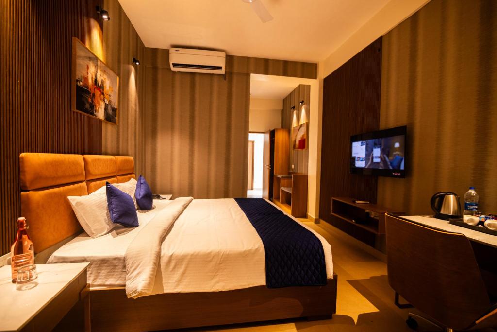 TV a/nebo společenská místnost v ubytování Ananthyam Resort by Anukulas