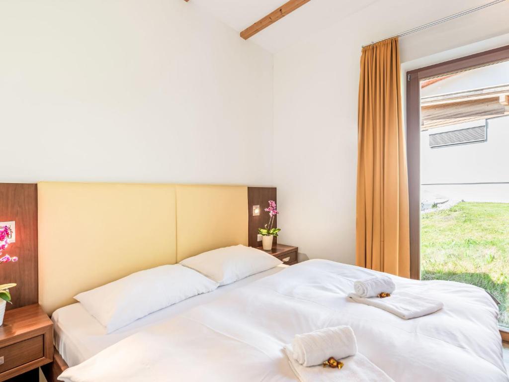 Posteľ alebo postele v izbe v ubytovaní Apartment Emma-9 by Interhome