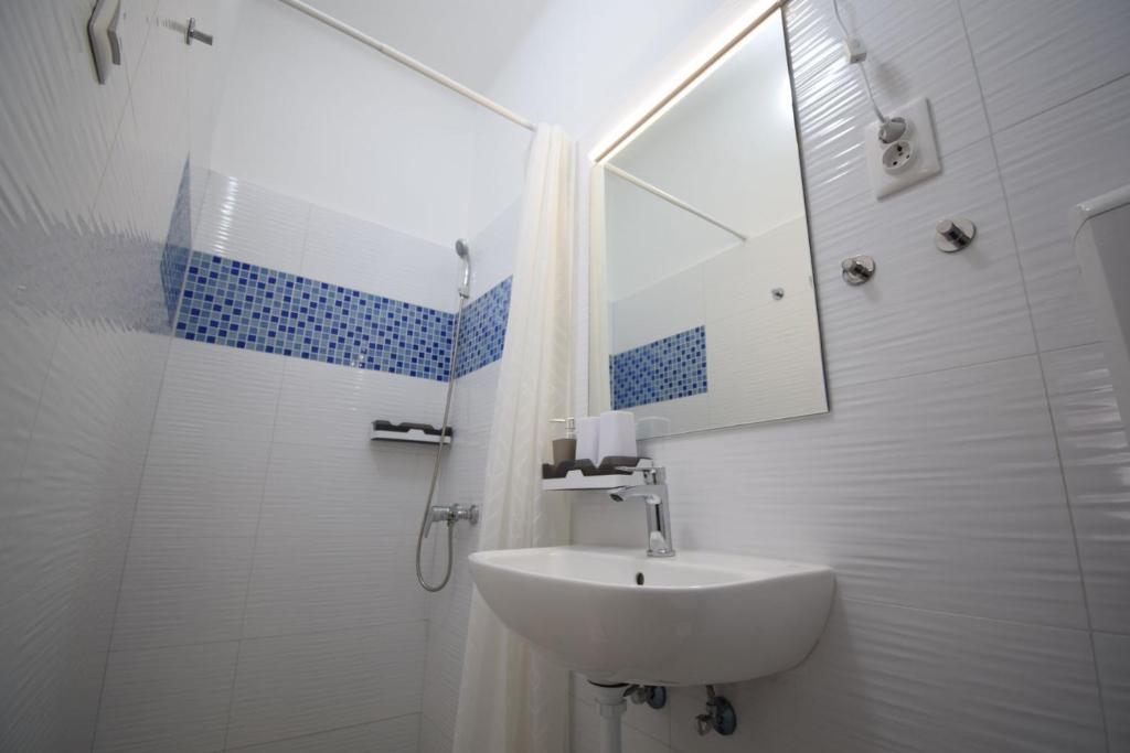 Koupelna v ubytování Omni Residence Vendégház