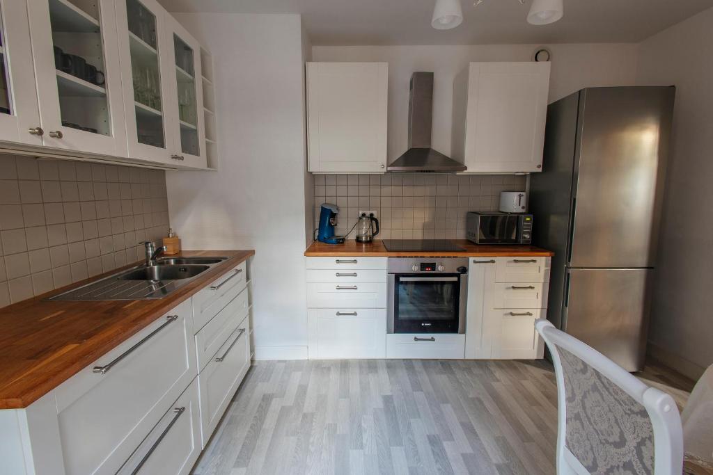 La Cure grand appartement familial 3 chambres avec terrasse et parking à 10 minutes de Colmar – photo 18