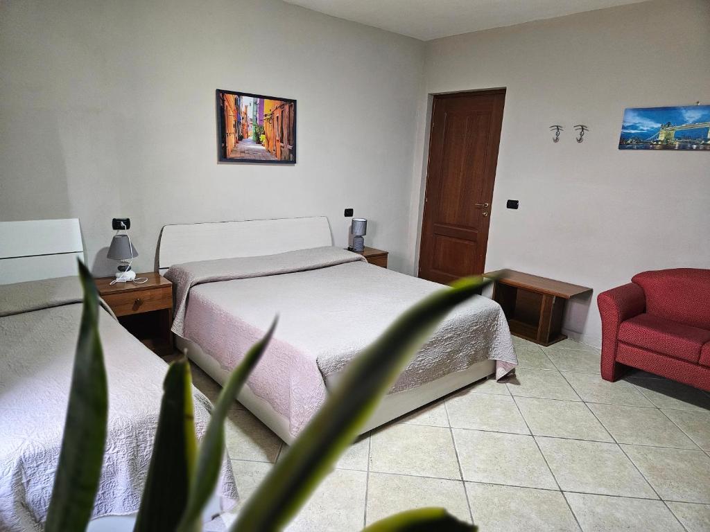 Postel nebo postele na pokoji v ubytování Garden Inn