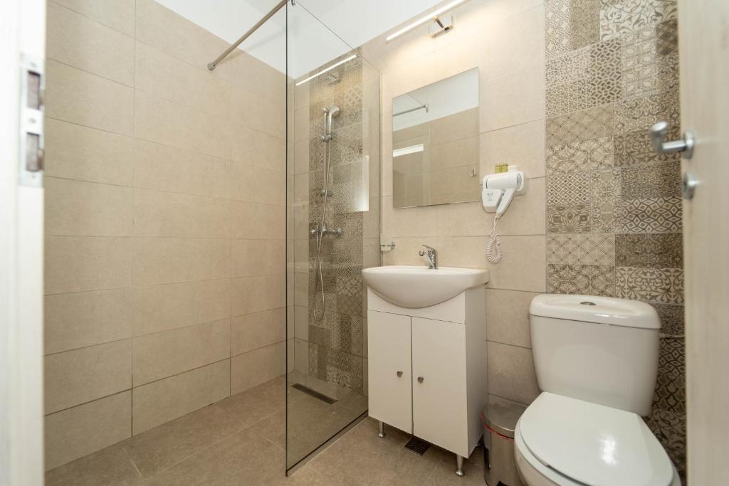 Koupelna v ubytování Hotel Cirus