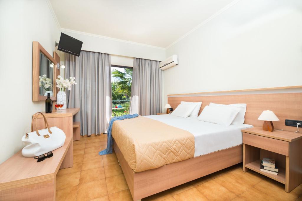 Postel nebo postele na pokoji v ubytování Ilios Hotel, Adults Only