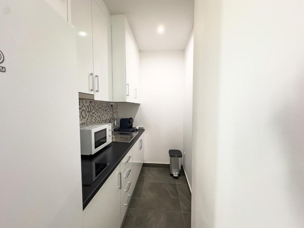 Kuchyň nebo kuchyňský kout v ubytování Historic Suites 22