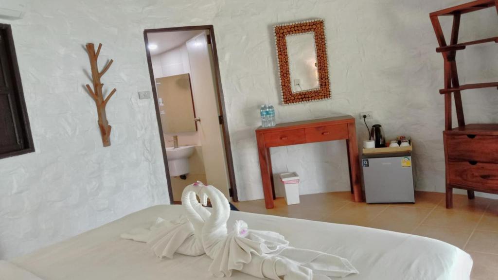 Postel nebo postele na pokoji v ubytování Sunrise Beach Resort