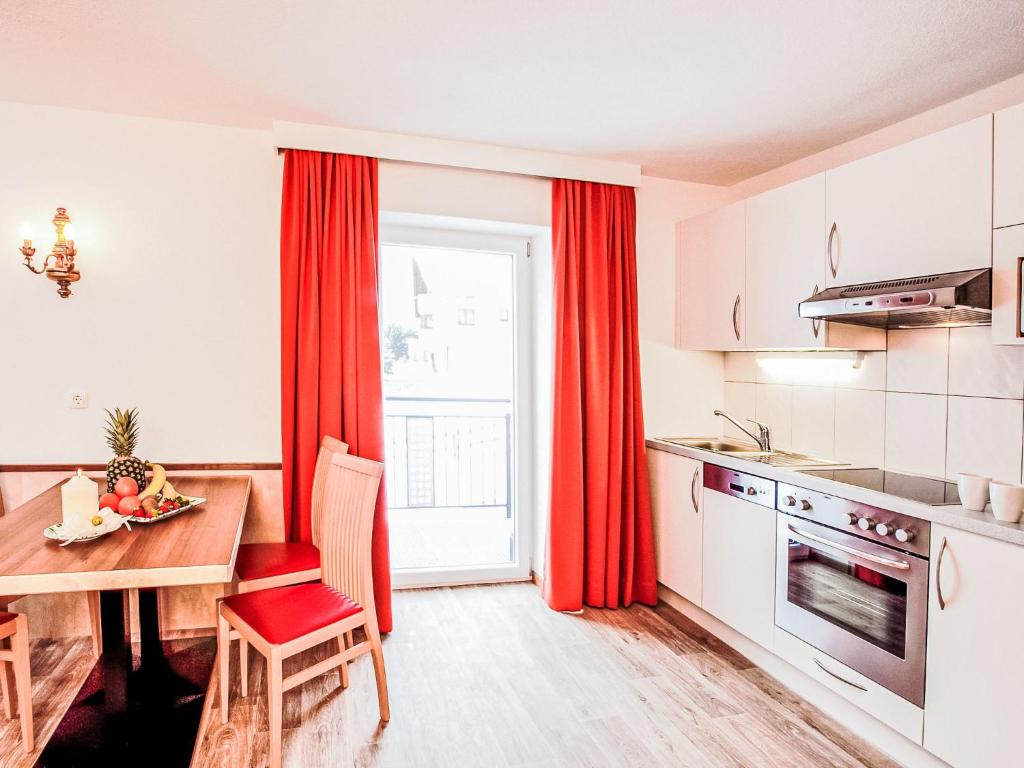 Kuchyň nebo kuchyňský kout v ubytování Apartment Typ III by Interhome