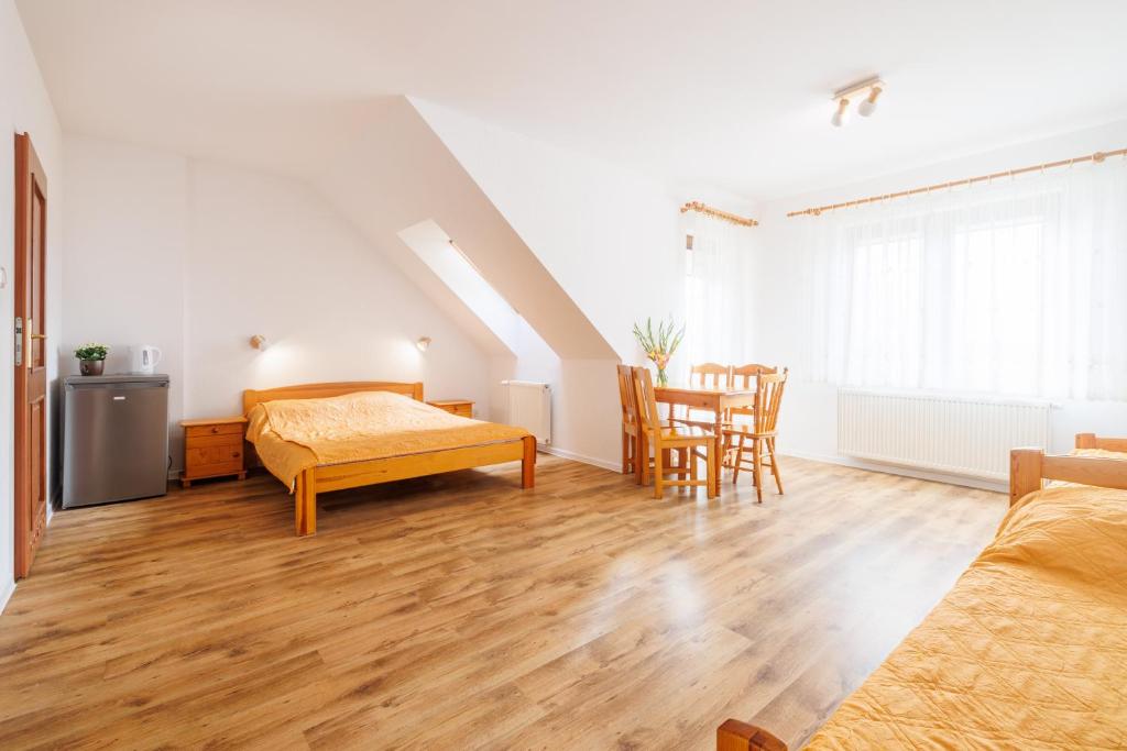 Postel nebo postele na pokoji v ubytování Willa Viki