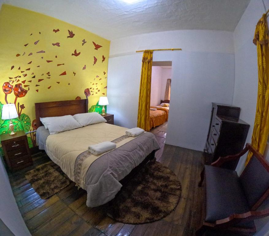 Postel nebo postele na pokoji v ubytování Colonial House Inn