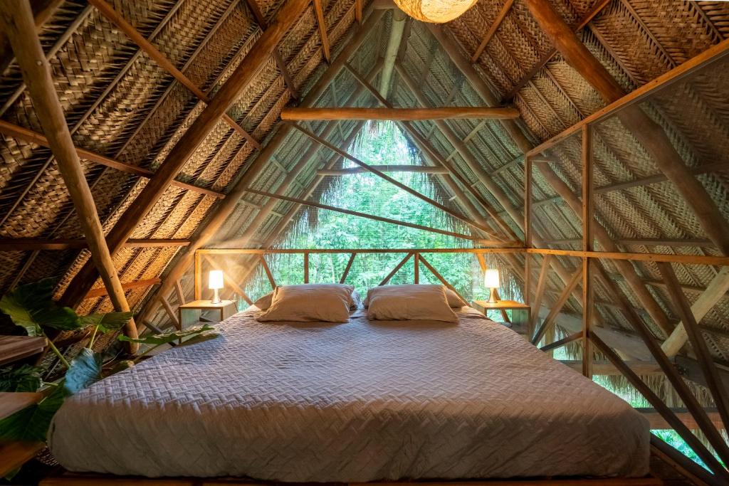 Postel nebo postele na pokoji v ubytování Canto Tayrona Ecolodges