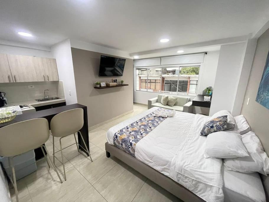 Postel nebo postele na pokoji v ubytování Castellana 202 - Apartaestudio loft en la Castellana Norte