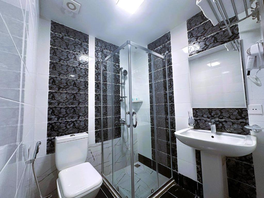 Koupelna v ubytování Amazon Hotel - Free Massage