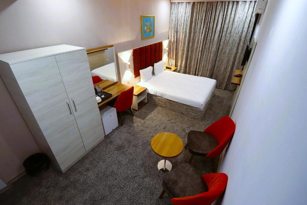 Postel nebo postele na pokoji v ubytování Amazon Hotel - Free Massage