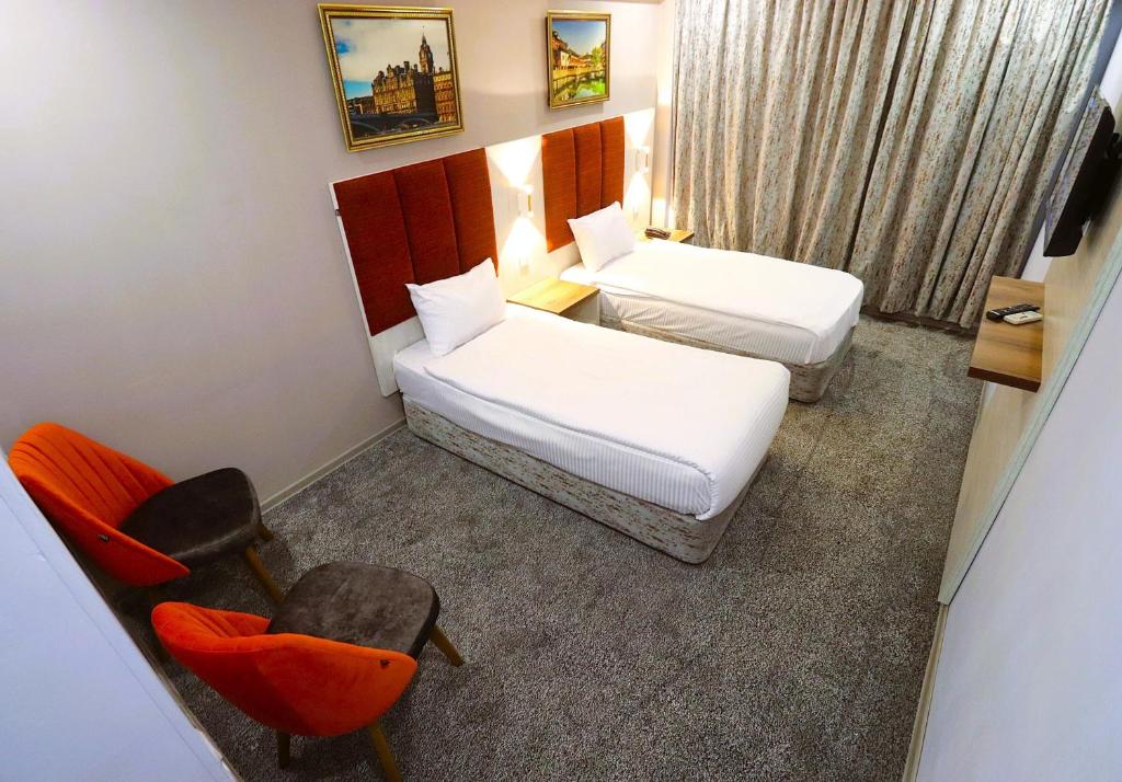 Postel nebo postele na pokoji v ubytování Amazon Hotel - Free Massage