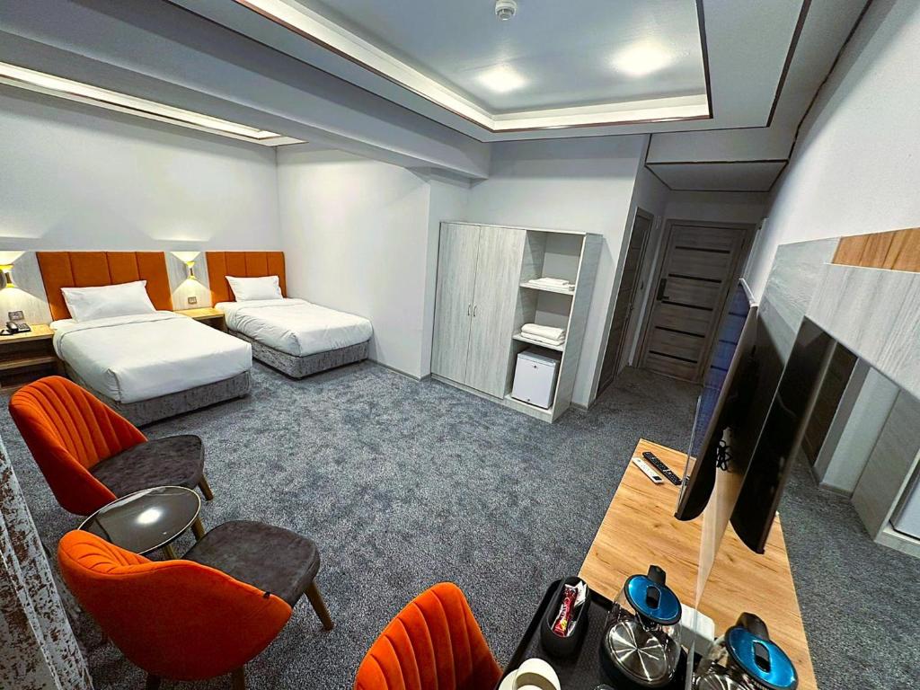 Postel nebo postele na pokoji v ubytování Amazon Hotel - Free Massage