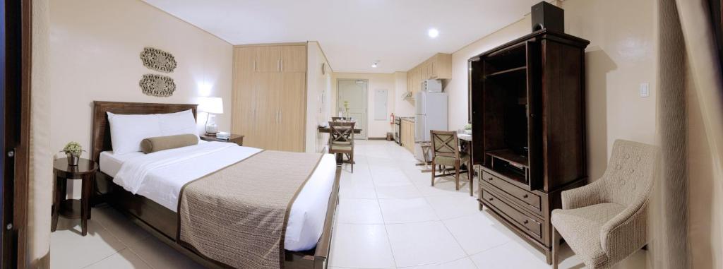 Postel nebo postele na pokoji v ubytování Crosswinds Resort Suites