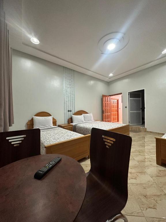 Postel nebo postele na pokoji v ubytování Hôtel Imilchil