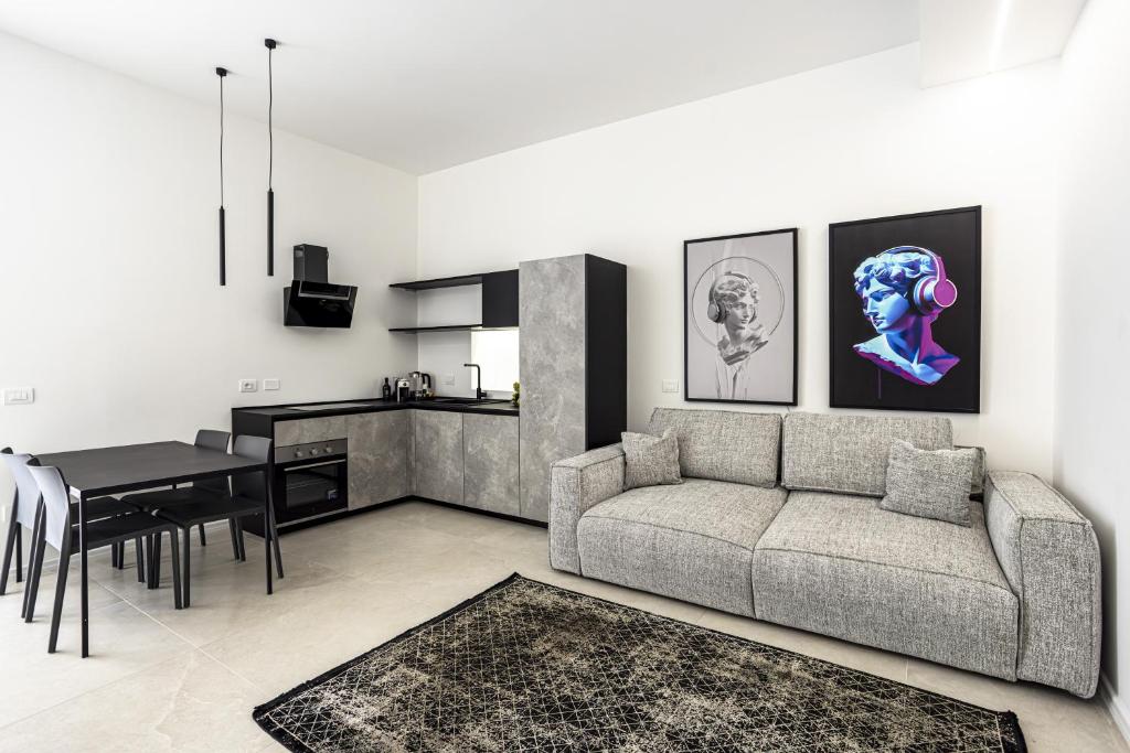 Kuchyň nebo kuchyňský kout v ubytování Nostos rooms & Apartments