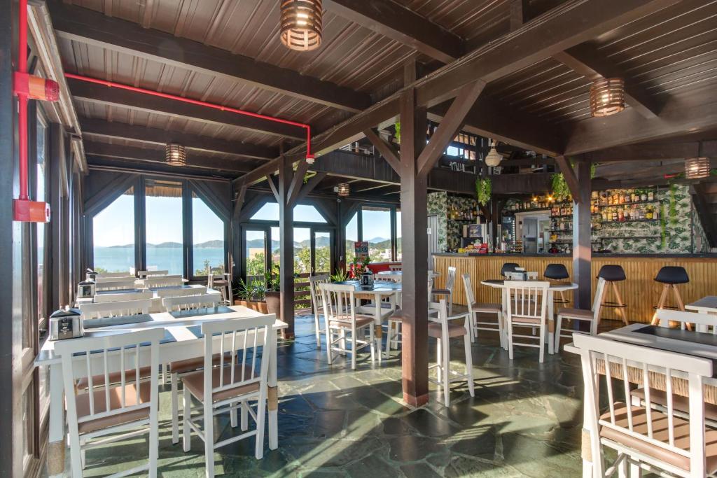 Um restaurante ou outro lugar para comer em Pousada do Arvoredo