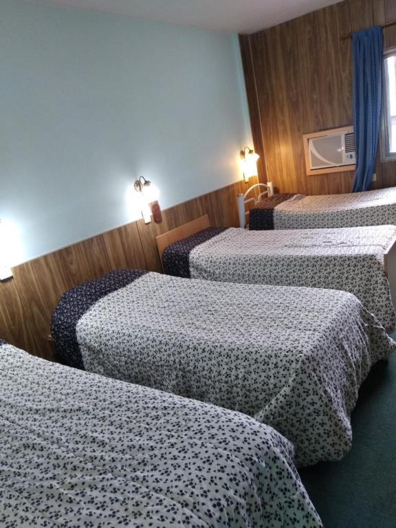 Postel nebo postele na pokoji v ubytování Alojamiento Avellaneda