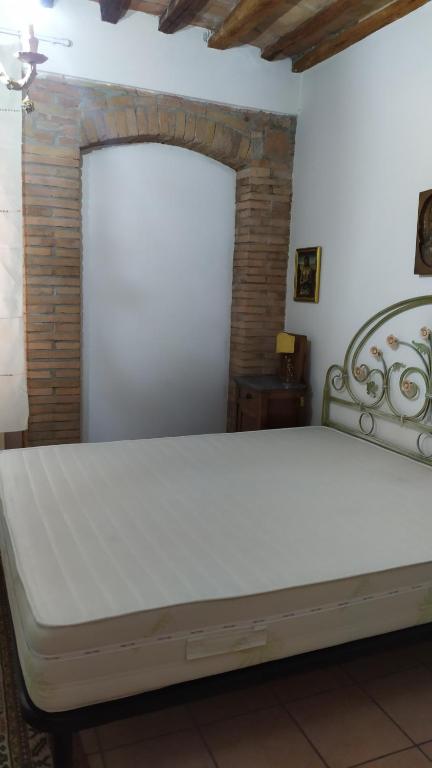 Łóżko lub łóżka w pokoju w obiekcie Centro Storico Perugia - Vista Su Assisi