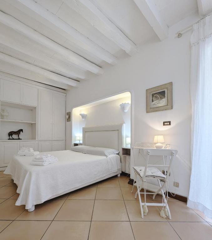 A bed or beds in a room at Setes - Appartamento in centro