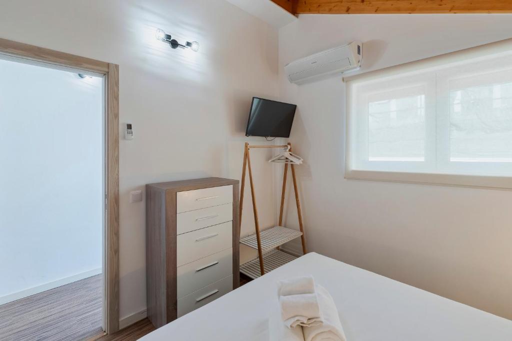 TV a/nebo společenská místnost v ubytování Maison du Village - Sesimbra