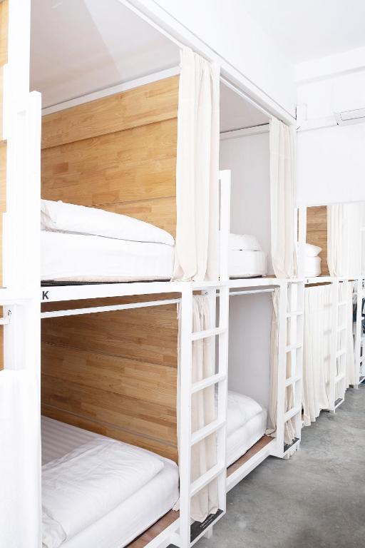 Postel nebo postele na pokoji v ubytování HOOD Hostel