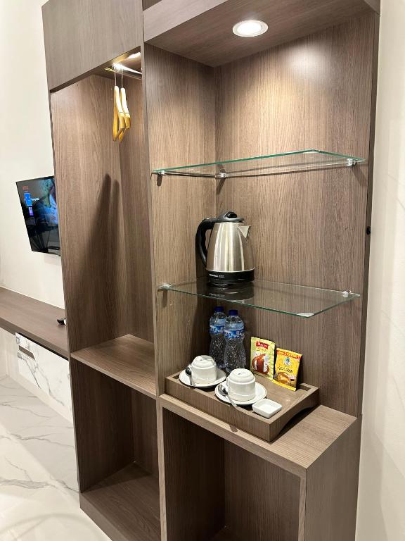 Příslušenství pro přípravu čaje a kávy v ubytování Resong Hotel
