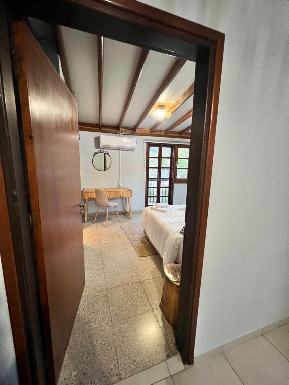 Postel nebo postele na pokoji v ubytování GaliniCafe22-suites