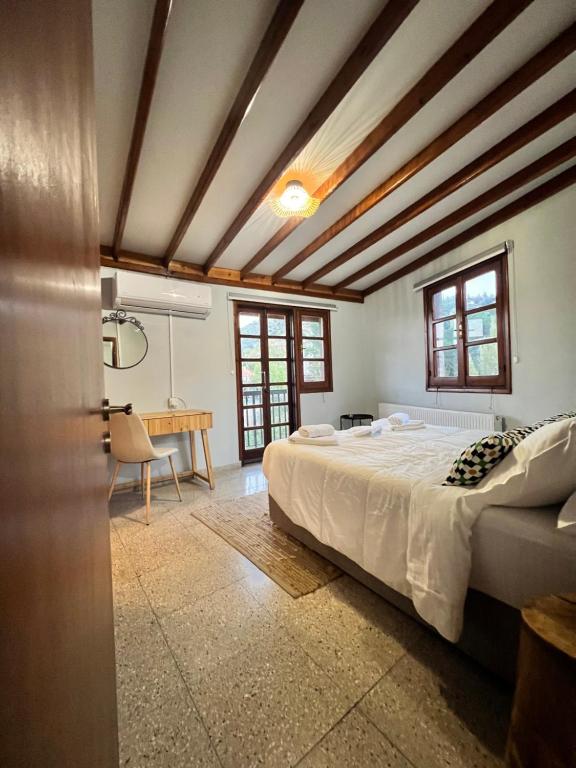 Postel nebo postele na pokoji v ubytování GaliniCafe22-suites