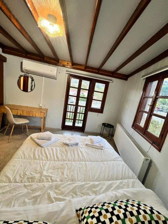 Postel nebo postele na pokoji v ubytování GaliniCafe22-suites