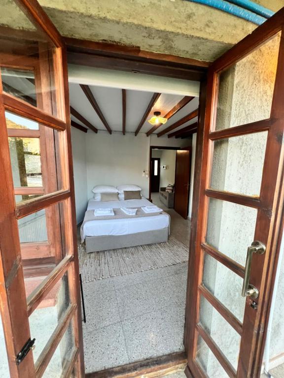 Postel nebo postele na pokoji v ubytování GaliniCafe22-suites