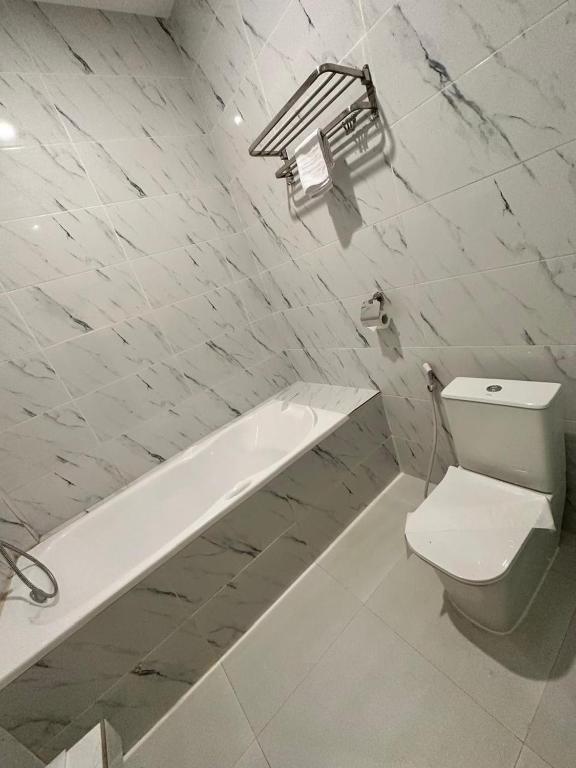Koupelna v ubytování Resong Hotel