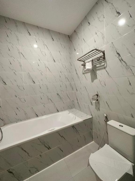 Koupelna v ubytování Resong Hotel