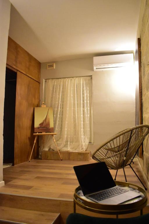 Posezení v ubytování Grand Arcanum Apartment 2 - Comfortable and Elegant