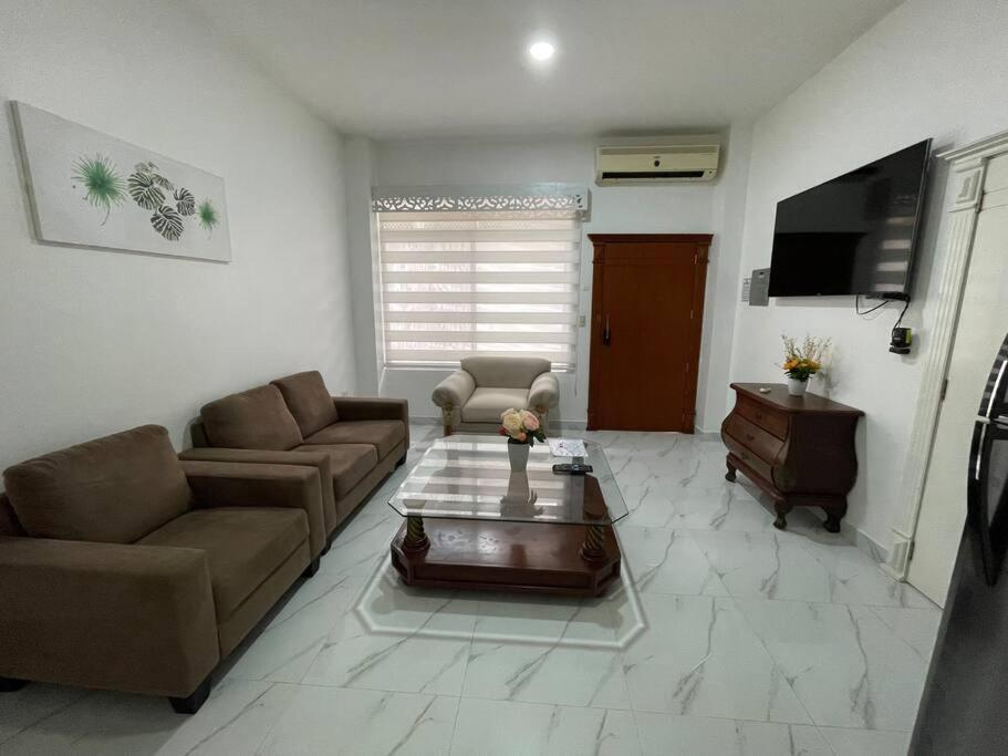 Гостиная зона в Acogedor departamento planta baja # 1
