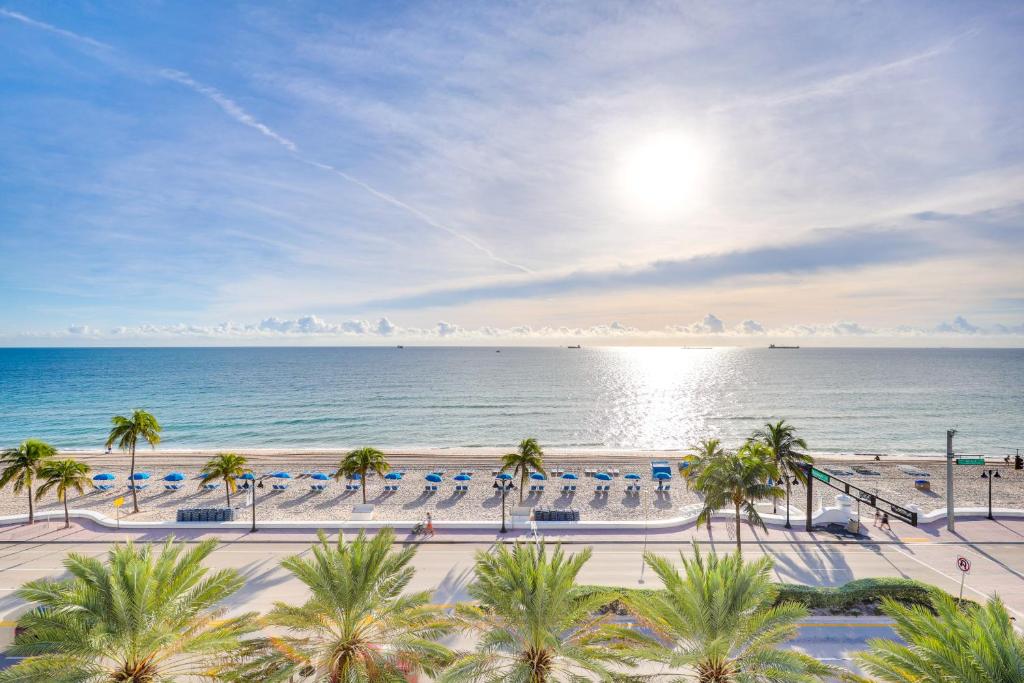 a view of the beach and the ocean at Resort Perks Luxe Florida Condo Near Restaurants! in Fort Lauderdale